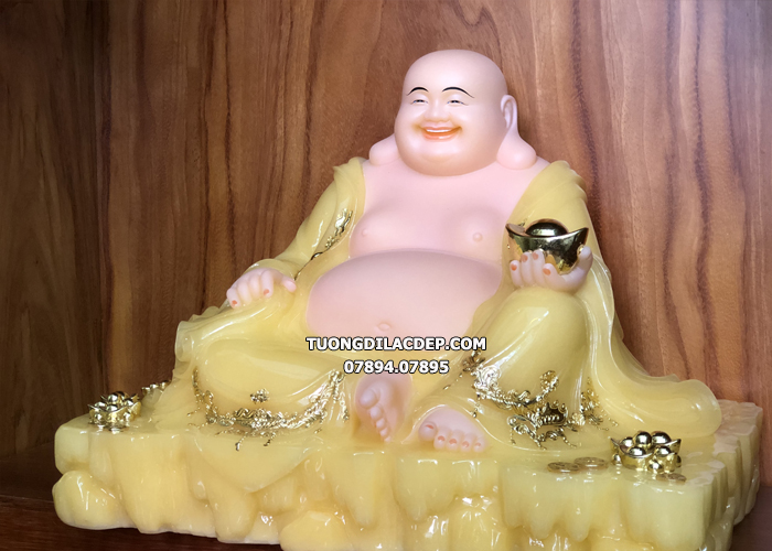 Tượng Phật Di Lặc ngồi cầm thỏi vàng đá thạch anh