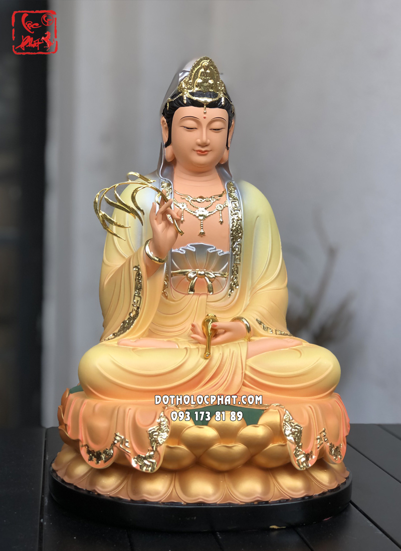 Tượng Quan Âm Bồ Tát bằng composite áo rũ màu vàng ngồi đài sen đẹp