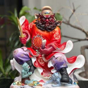 Tượng Chung Quỳ áo gấm đỏ ngồi bệ đá
