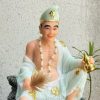 tuong-te-cong-cam-quat-ao-xanh-ngoc-ngoi-be-da-ttc-008-4