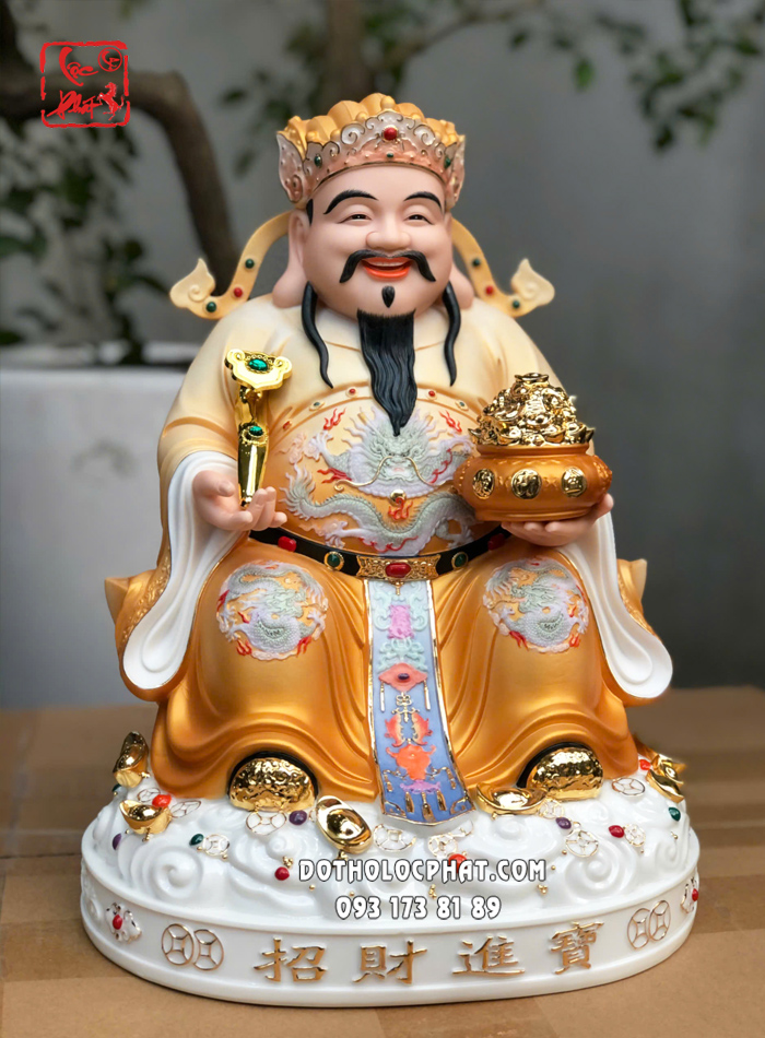 Tượng Thần Tiền như ý hũ vàng bằng sứ áo vàng đế mây