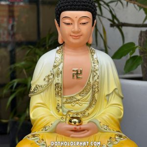 Tượng Phật A Di Đà áo vàng bằng composite đế đỏ cam