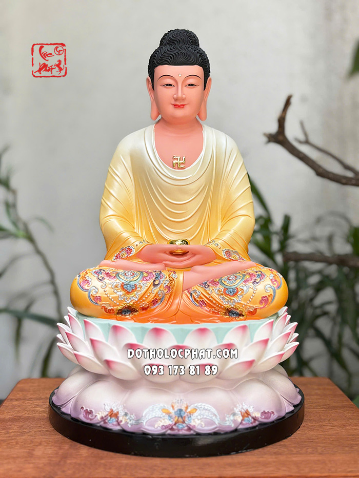 Tượng Phật A Di Đà áo vàng đế sen hồng bằng composite