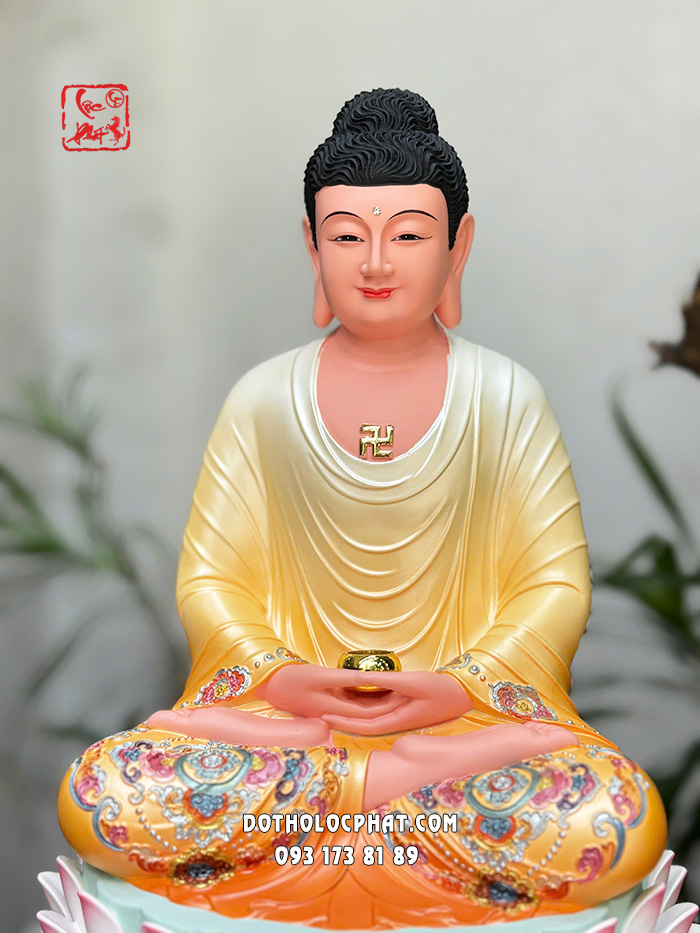 Tượng Phật A Di Đà áo vàng đế sen hồng bằng composite