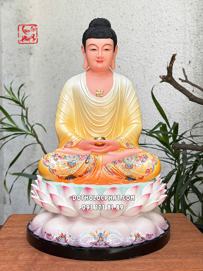 Tượng Phật A Di Đà áo vàng đế sen hồng bằng composite