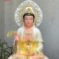 Tượng Quan Âm Bồ Tát trắng cam áo rũ viền hoa có hào quang